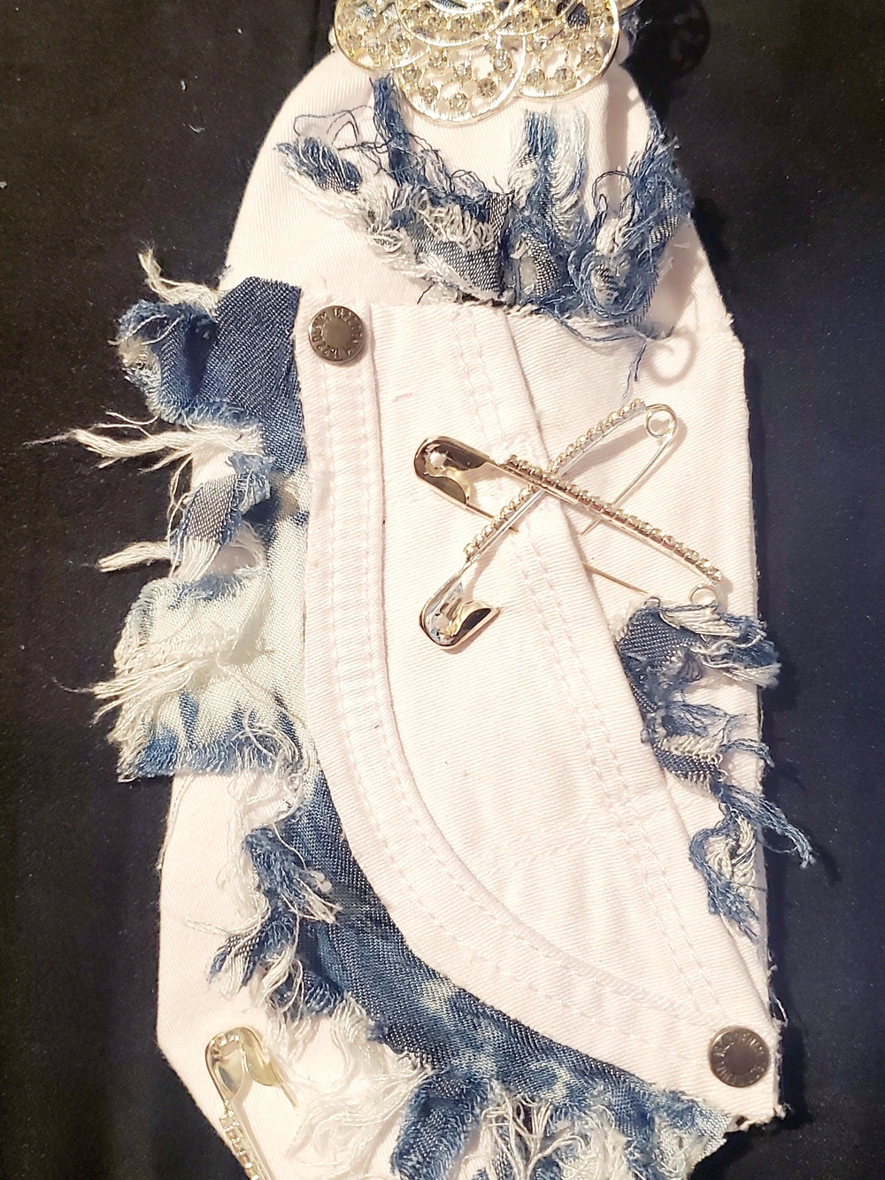 White Distressed Women's Jeans Pocket Detail with Blue Fringe
